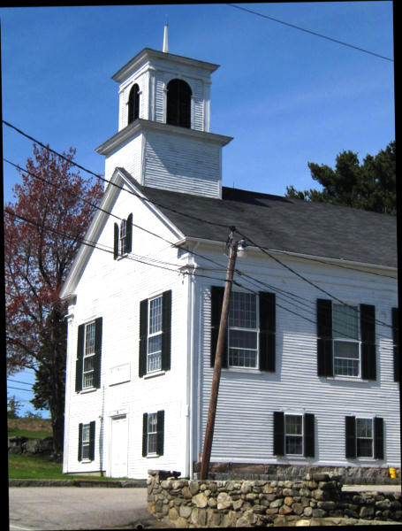 The exterior of Rye Town Hall, a historic building with white siding.